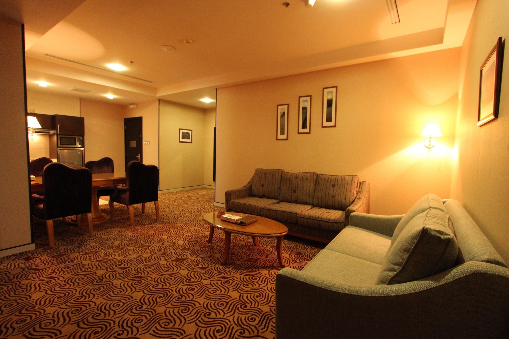 Awaliv International Hotel Таиф Экстерьер фото A suite at the hotel